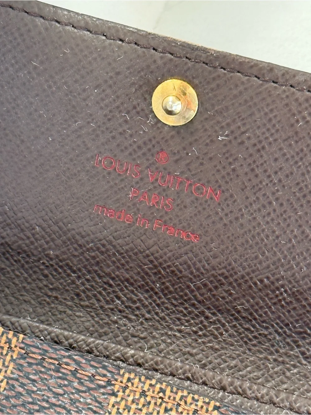 SOLD Louis Vuitton Brown Damier Ebene Canvas Key Pouch with Gold Button